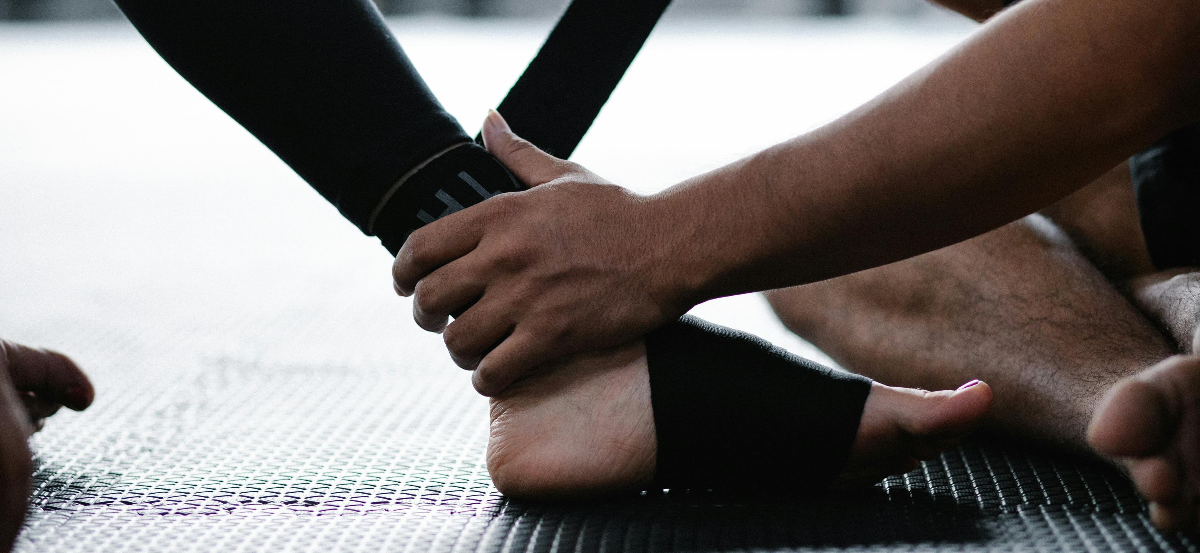 Physician examining patient's ankle